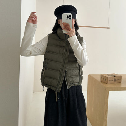 Dames gilet matelassé avec cordon de taille ajustable et poches pratiques Chic und Stil