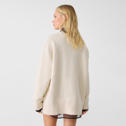 Pull oversized femme avec un motif de chien unique Chic und Stil