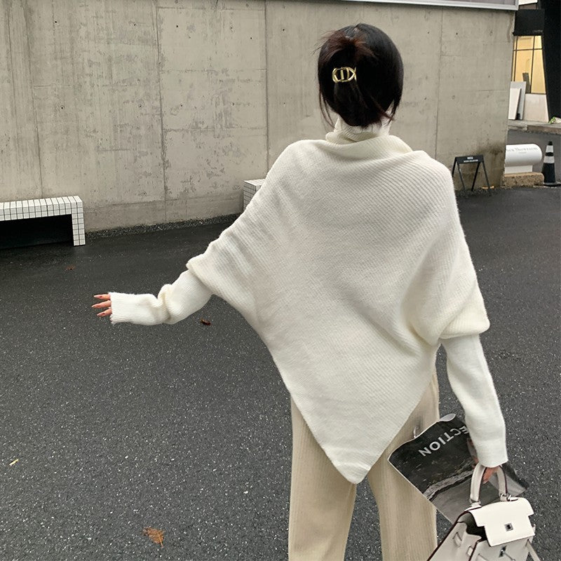 Pull en tricot pour femmes avec coupe asymétrique et col montant Chic und Stil