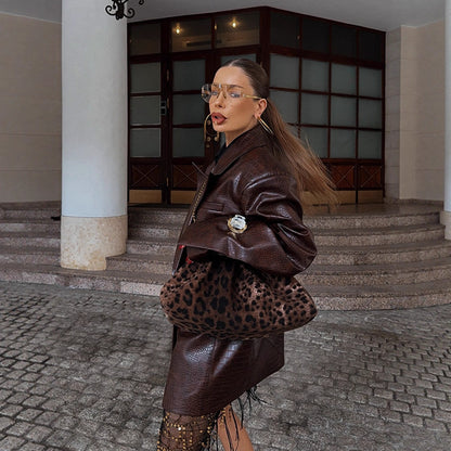 Blazer en simili cuir à la mode pour femmes avec effet croco Chic und Stil