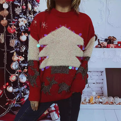 Pull féminin festif avec motif de Noël et appliqués scintillants Chic und Stil