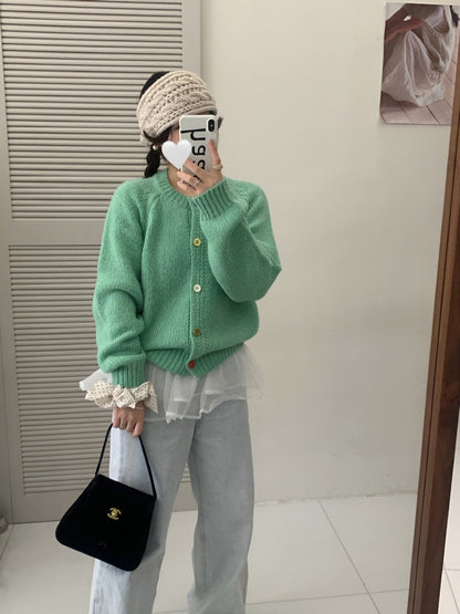 Dames Pull-over douillet avec des boutons colorés et coupe décontractée Chic und Stil