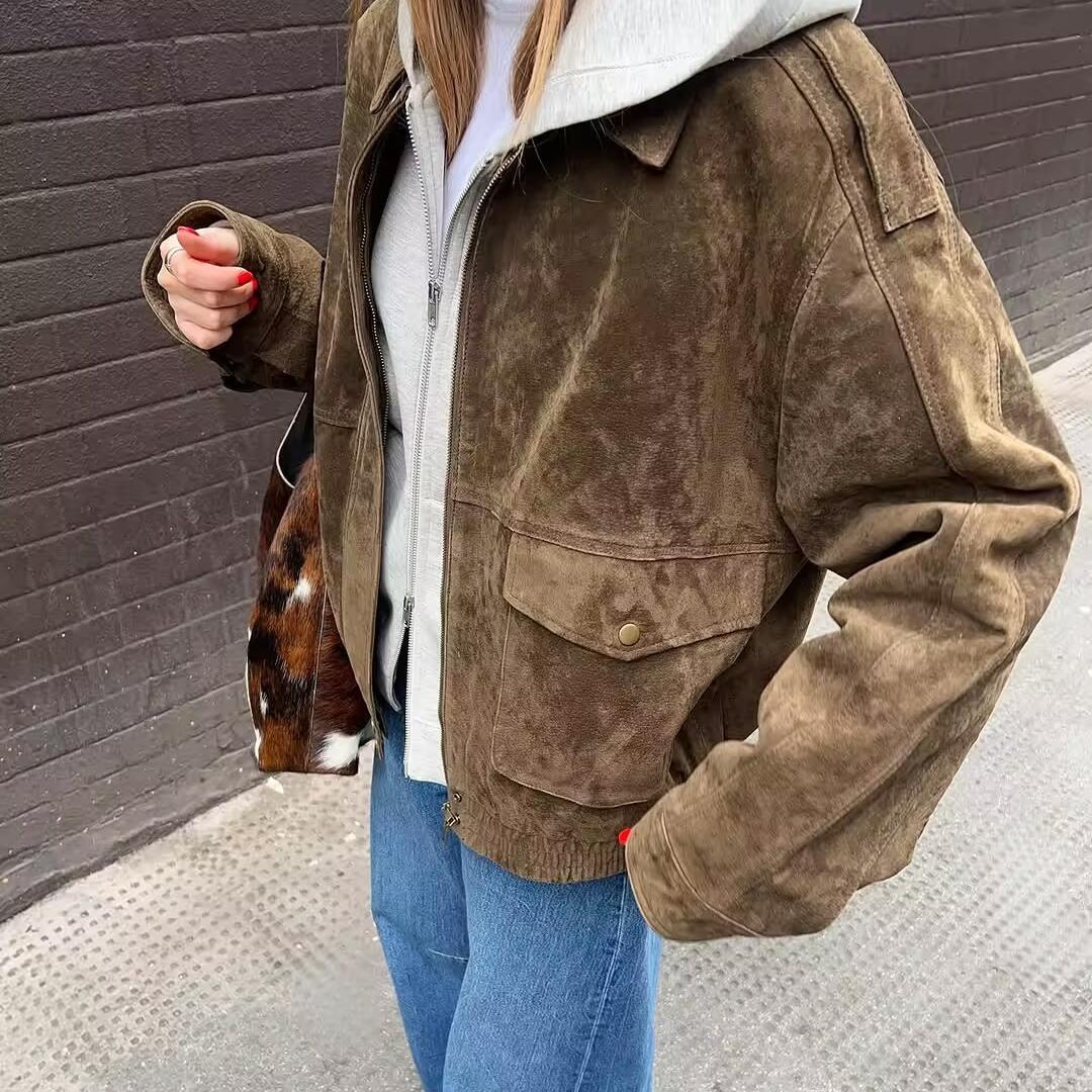 Women's faux leather jacket with practical pockets and elastic waist Chic und Stil