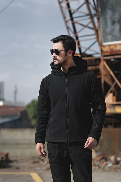 Veste en polaire pour hommes avec plusieurs poches et col de capuche ajustable Chic und Stil