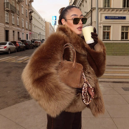 Faux fur jacket for women with a voluminous cut and elegant collar Chic and Style