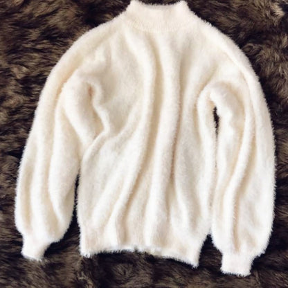 Pull en mohair pour femmes avec col roulé, manches bouffantes et design texturé Chic und Stil