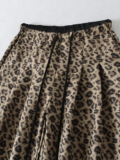 Trendy leopard wide-leg pants for women with elastic waistband and tie belt Chic and Style