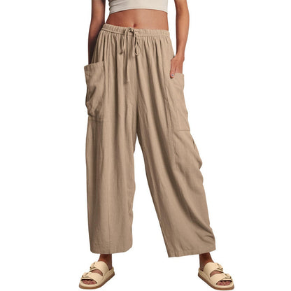 Casual harem pants for women with practical side pockets and loose fit Chic and Style