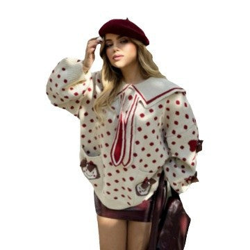 Pull en gros tricot pour femmes avec un col unique et des détails féminins Chic und Stil