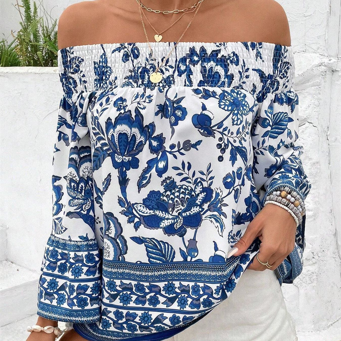 Blouse femme décolletée avec motifs floraux et bord élastique Chic und Stil