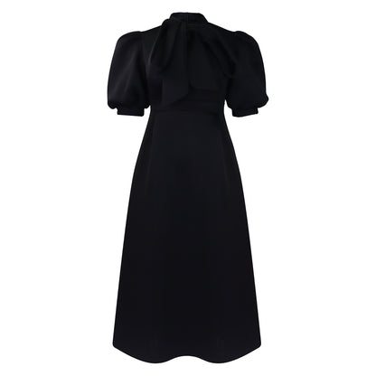 Robe midi femme avec un élégant noeud et des manches bouffantes Chic und Stil