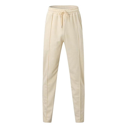 Pantalon de jogging sportif pour hommes avec taille élastique et poches zippées Chic und Stil