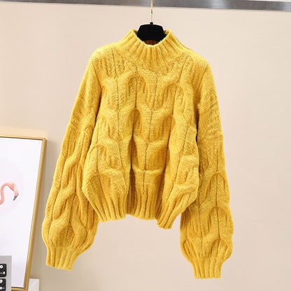 Pull en tricot confortable pour femmes avec des manches volumineuses et un motif torsadé Chic und Stil