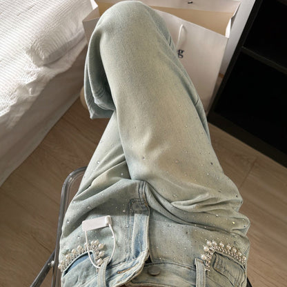 Women's denim pants with elegant pearl embellishments and a trendy cut Chic und Stil