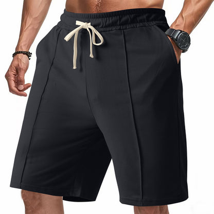 Shorts de sport confortables pour hommes avec taille élastique et poches latérales pratiques Chic und Stil