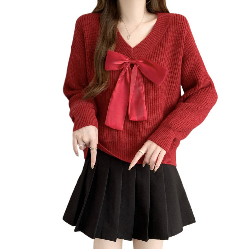 Pull en tricot pour femme avec décolleté en V et accent de nœud décoratif Chic und Stil