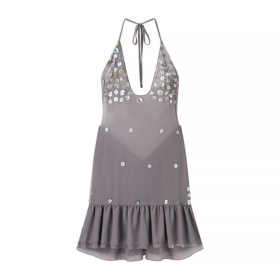 Robe d'été pour femmes avec des sequins scintillants et un ourlet volumineux Chic und Stil
