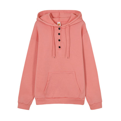 Pull à capuche pour femmes avec détails en bouton et poche kangourou pratique Chic und Stil