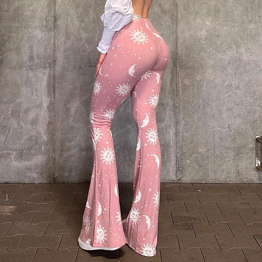 Flared yoga pants for women with a fun moon and sun pattern Chic and Style