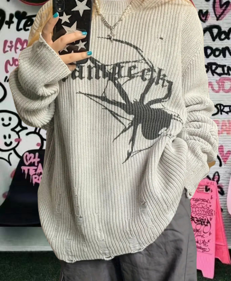 Pull en maille surdimensionné pour femmes avec un motif de araignée frappant Chic und Stil