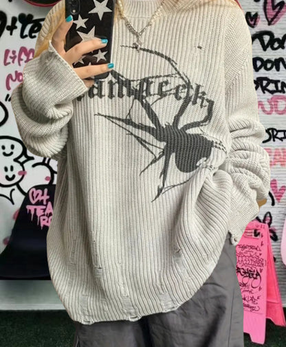 Pull en maille surdimensionné pour femmes avec un motif de araignée frappant Chic und Stil