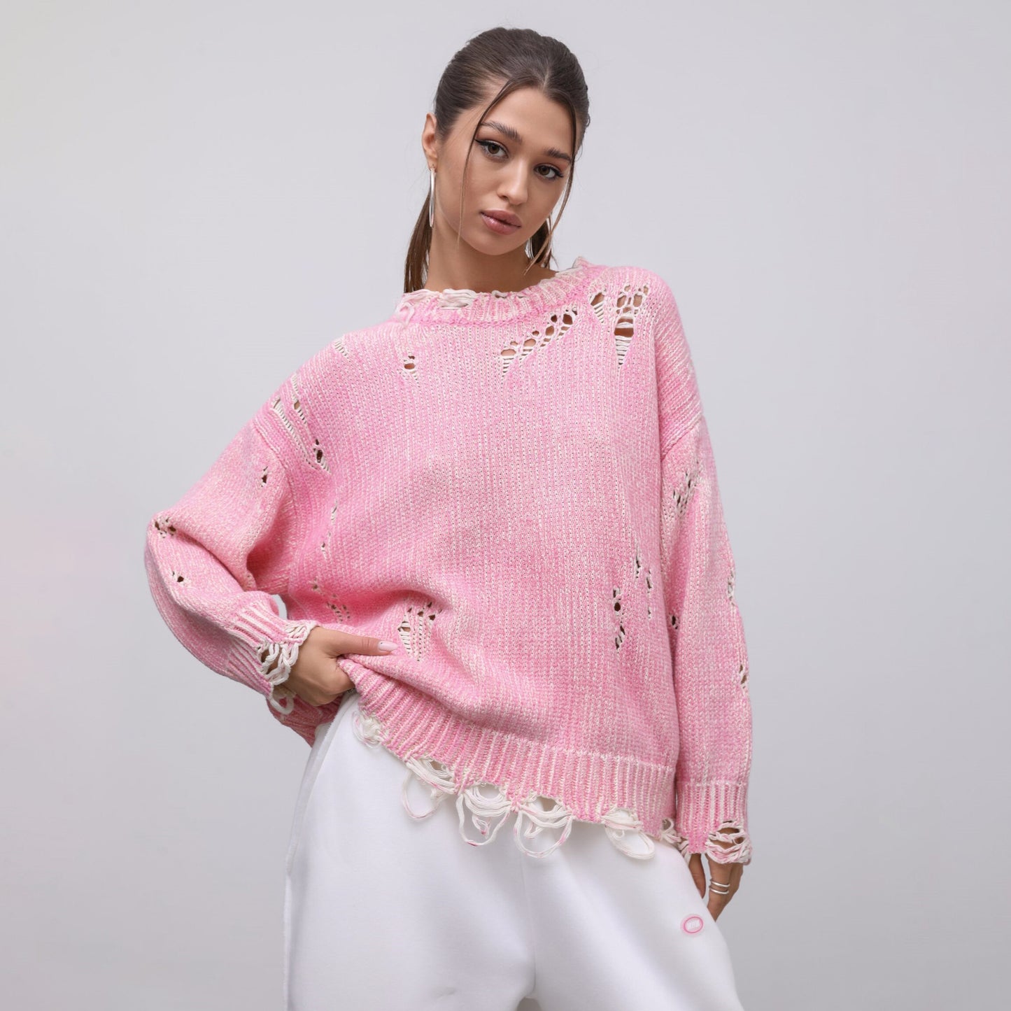 Ladies oversized knitted casual pullover with a unique hole pattern Chic and Style