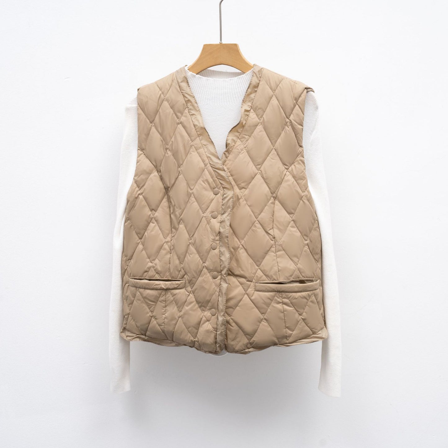 Dames gilet matelassé avec coupe asymétrique Chic und Stil