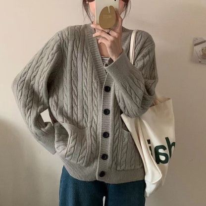 Dames gilet en gros tricot avec motif en trèfle et poches pratiques Chic und Stil