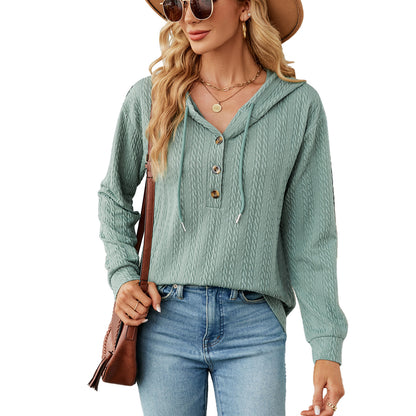 Pull à capuche décontracté pour femmes avec surface texturée et détails de boutons Chic und Stil