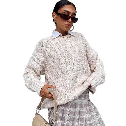 Pull femme en grosse maille avec des manches volumineuses et un motif torsadé classique Chic und Stil
