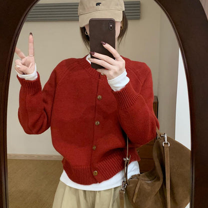 Pull en tricot confortable pour femmes avec détails de boutons et épaules tombantes Chic und Stil