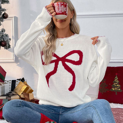 Dames pull confortable avec motif de nœud festif Chic und Stil