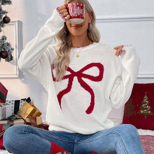Dames pull confortable avec motif de nœud festif Chic und Stil