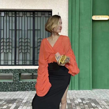 Blouse drapée pour femmes avec des manches volumineuses et un design élégant Chic und Stil