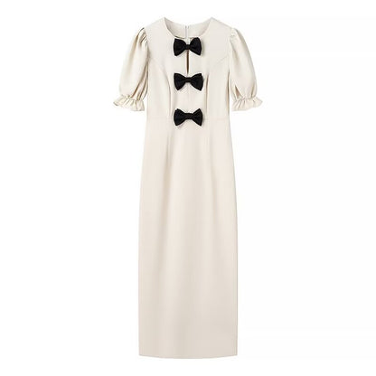 Dames Robe maxi élégante avec détail de nœud unique et conception à manches bouffantes Chic und Stil