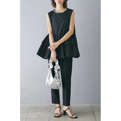 Dames Haut en peplum fluide et ensemble pantalon à pois Chic und Stil