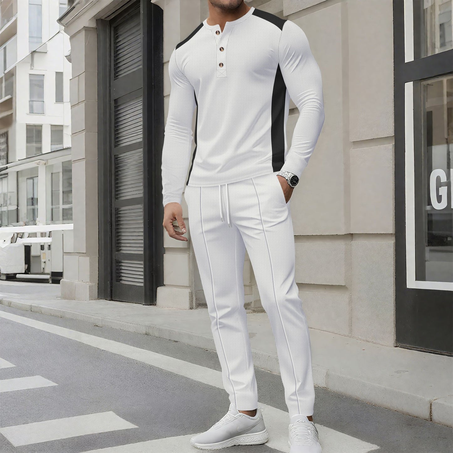 Costume de loisirs pour hommes avec un élégant haut Henley et un pantalon de jogging confortable Chic und Stil