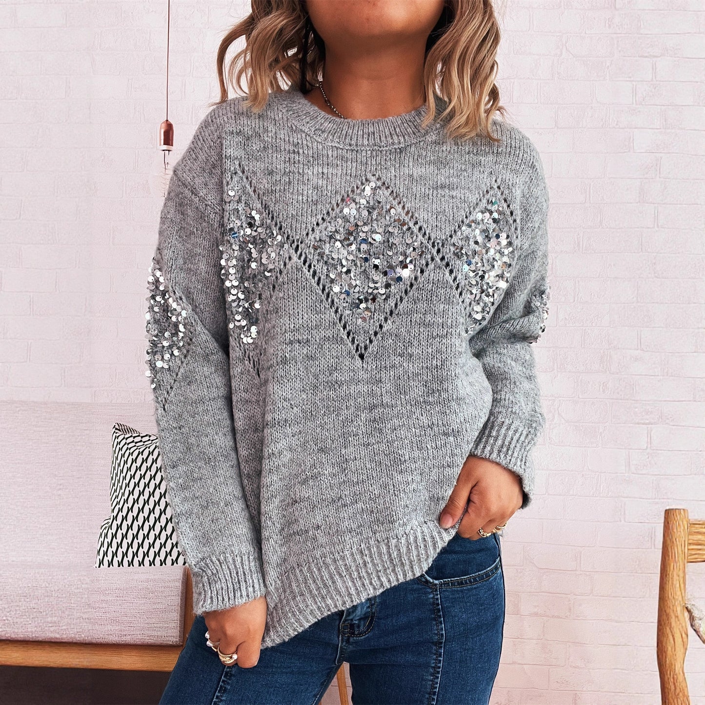 Pull en tricot pour femmes avec des applications scintillantes Chic und Stil