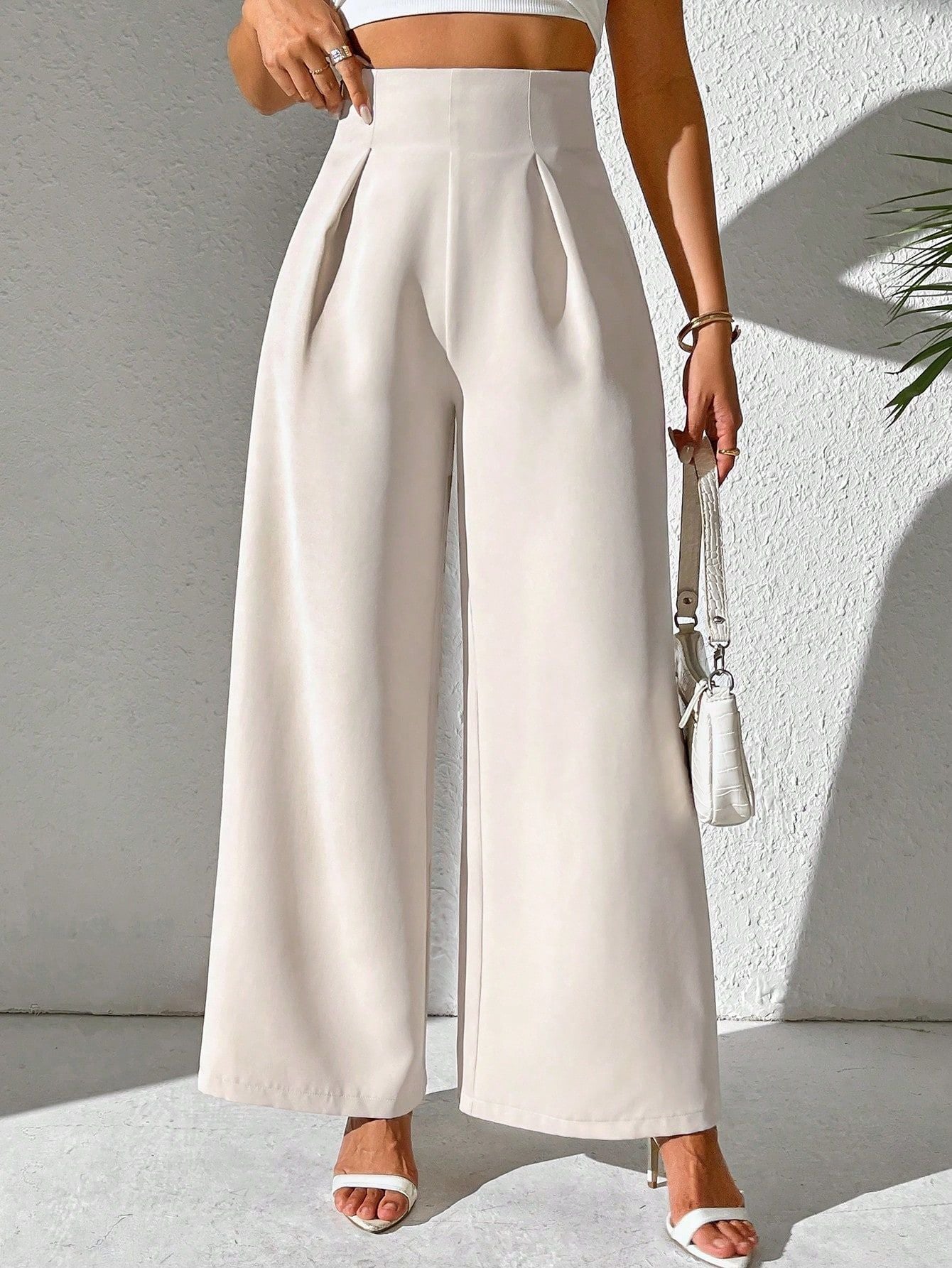 Wide women's palazzo pants with an elegant cut and high waist Chic and Style
