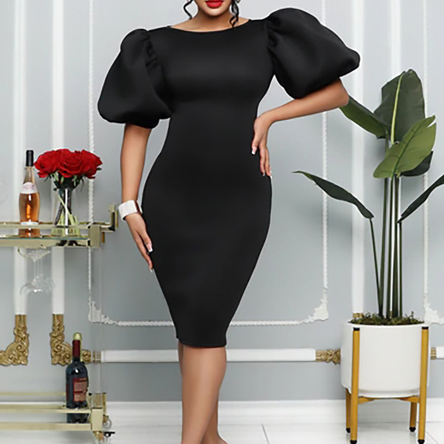 Robe ajustée pour dames avec des manches bouffantes volumineuses Chic und Stil