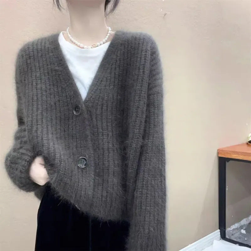 Dames Pull-over en tricot douillet avec de gros boutons Chic und Stil