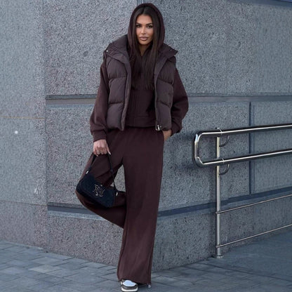 Dames gilet matelassé avec capuche Chic und Stil