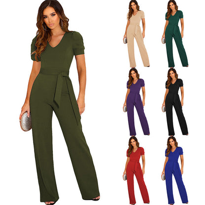 Elegant women's jumpsuit with waist belt and puff sleeves Chic and Style