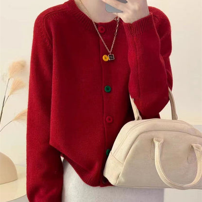 Women's playful knit vest with colorful button details Chic and Stil