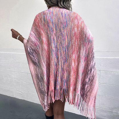 Ladies fashionable poncho with luxurious faux fur trim and creative fringes Chic and Style