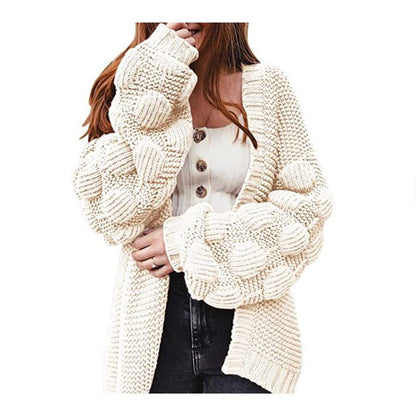 Veste en tricot pour femmes avec des manches bouffantes volumineuses et un aspect de maille structuré Chic und Stil