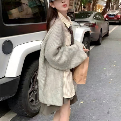 Women's comfortable knitted vest with button closure and chic, stylish V-neck