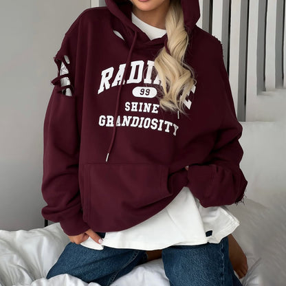 Pull à capuche oversize pour femmes avec des détails de déchirure tendance Chic und Stil