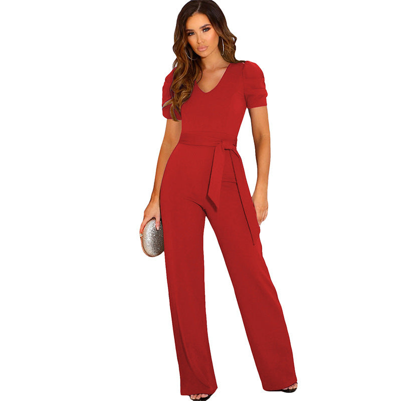 Elegant women's jumpsuit with waist belt and puff sleeves Chic and Style