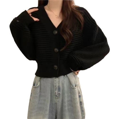 Cardigan en tricot confortable et élégant pour femmes avec des manches volumineuses et des détails de boutons Chic und Stil
